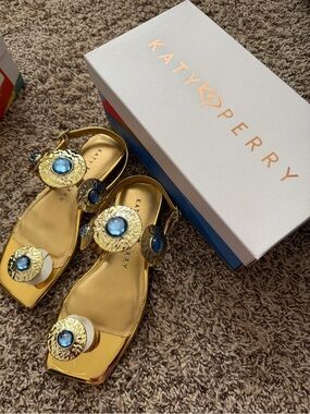 Katy Perry Collections Gold Metallic Sandals with Blue Jewel Accents
